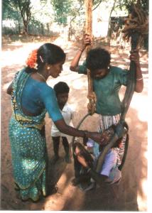 Karpagam giving medicines     